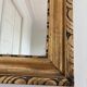 Antique French giltwood wall mirror in gold
