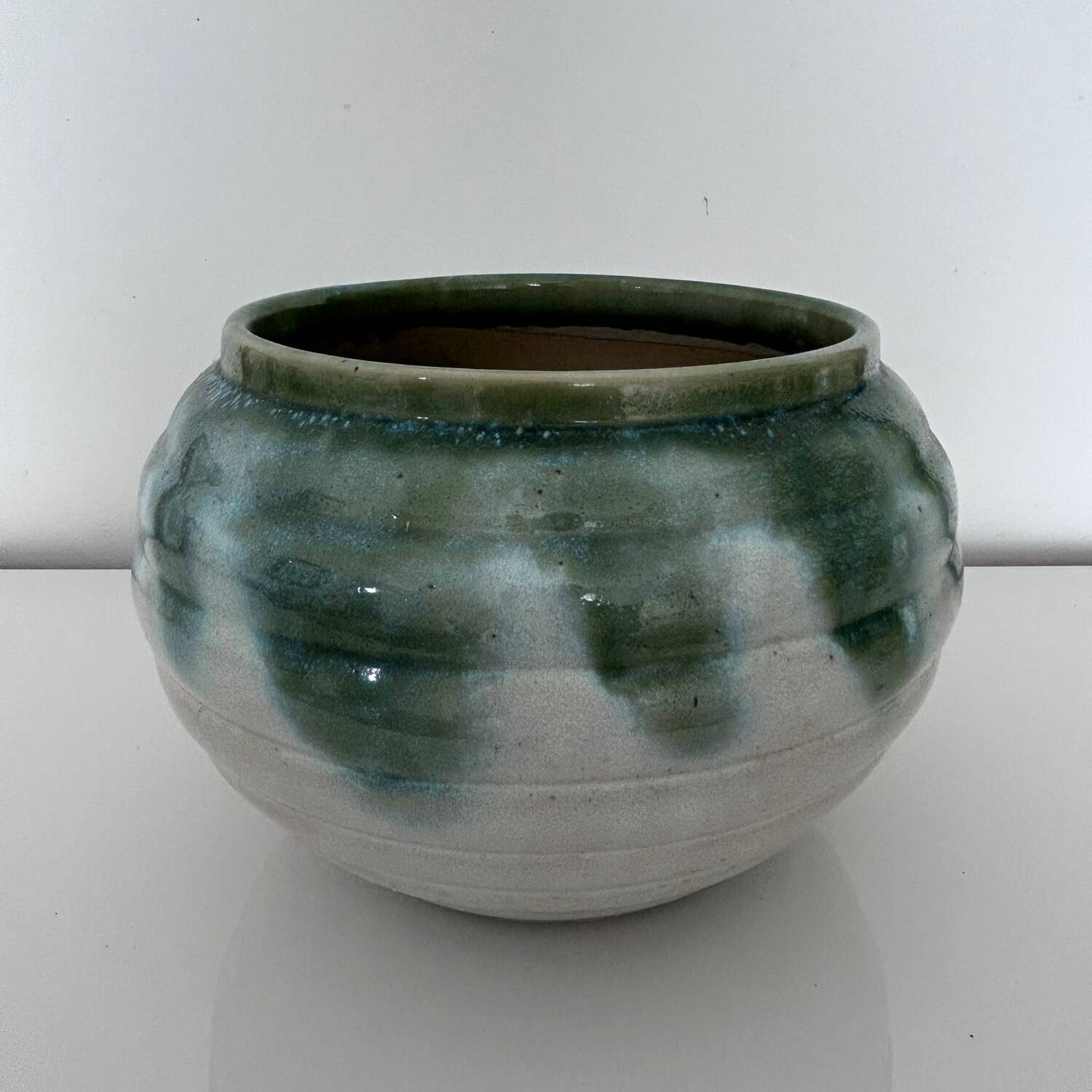 Green flamed stoneware pot