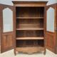 Walnut glazed bookcase with nineteenth century rose window