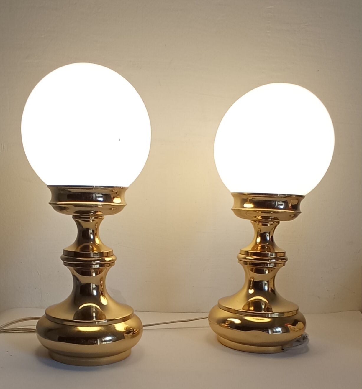 Pair of gilded metal lamps