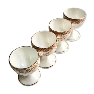 Suite of 4 old porcelain cockroaches decorated with sepia-printed leaves