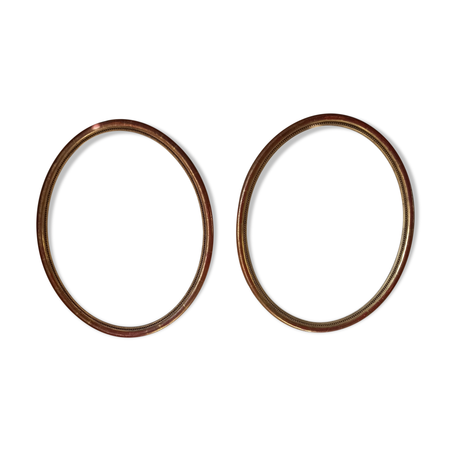 Pair of oval gilded frames Louis XVI style