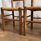 4 Art Populaire chairs in wood and straw