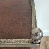 Pedestal table in leather and metal