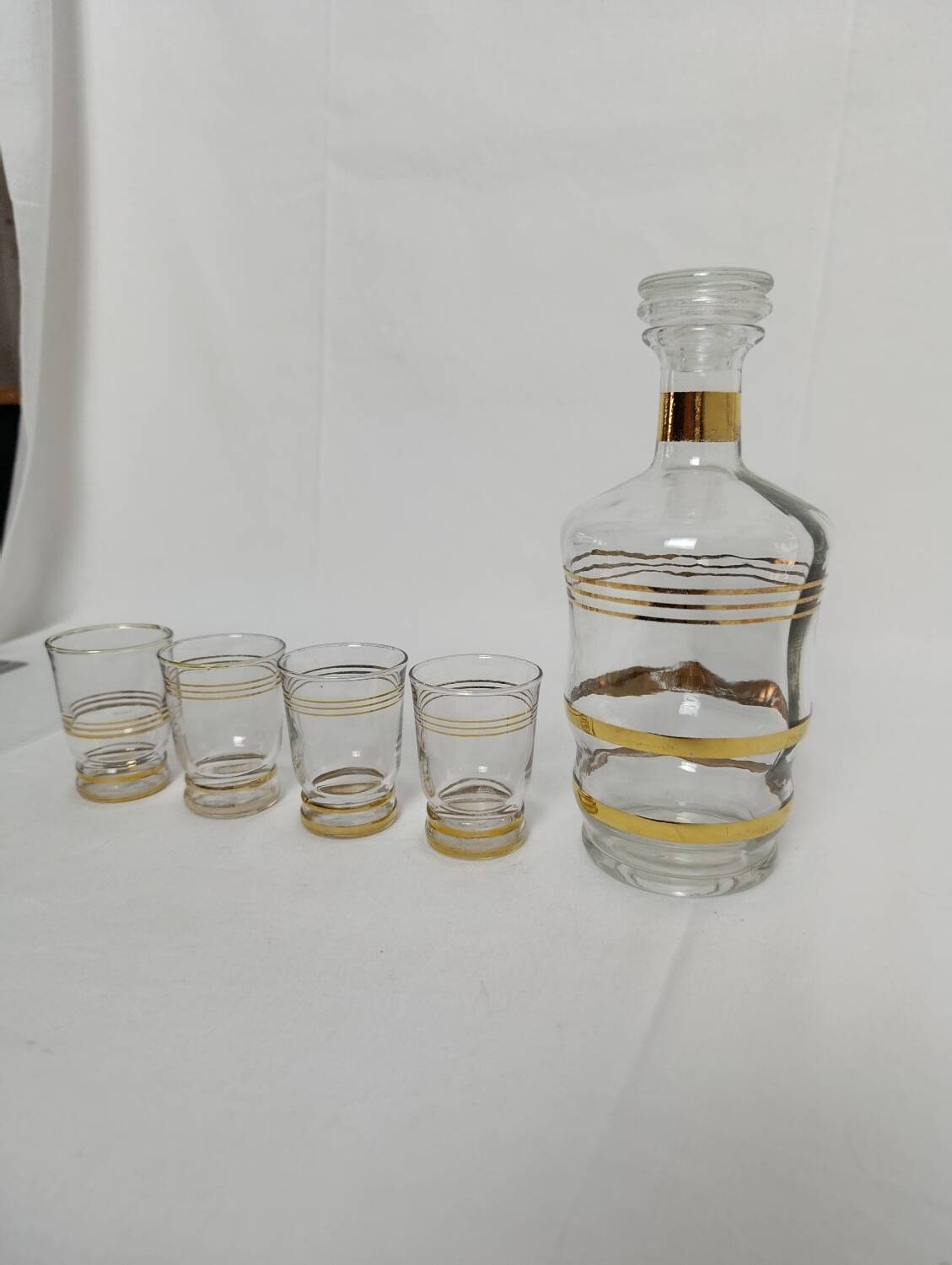 Liqueur carafe and its 4 small glasses