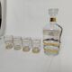 Liqueur carafe and its 4 small glasses