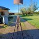 Wood and chrome tripod lamp