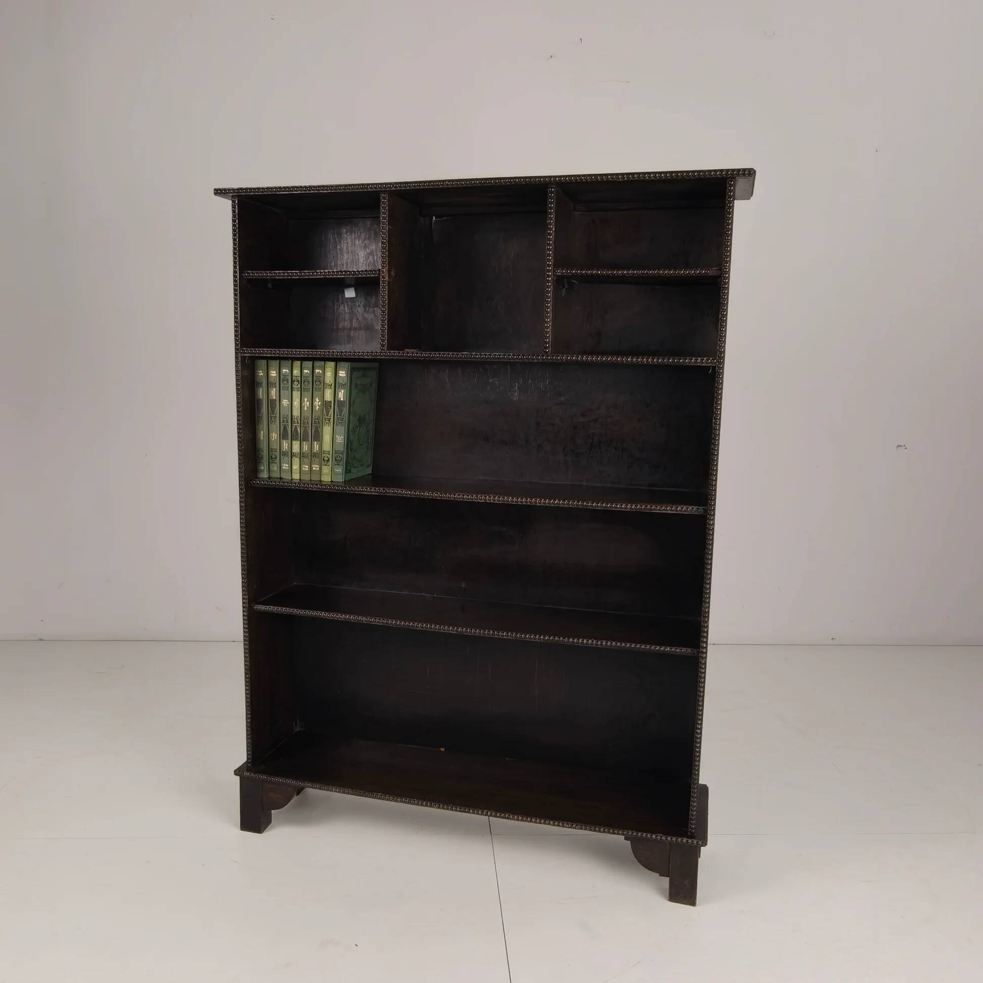 20th century open bookcase with bead motif