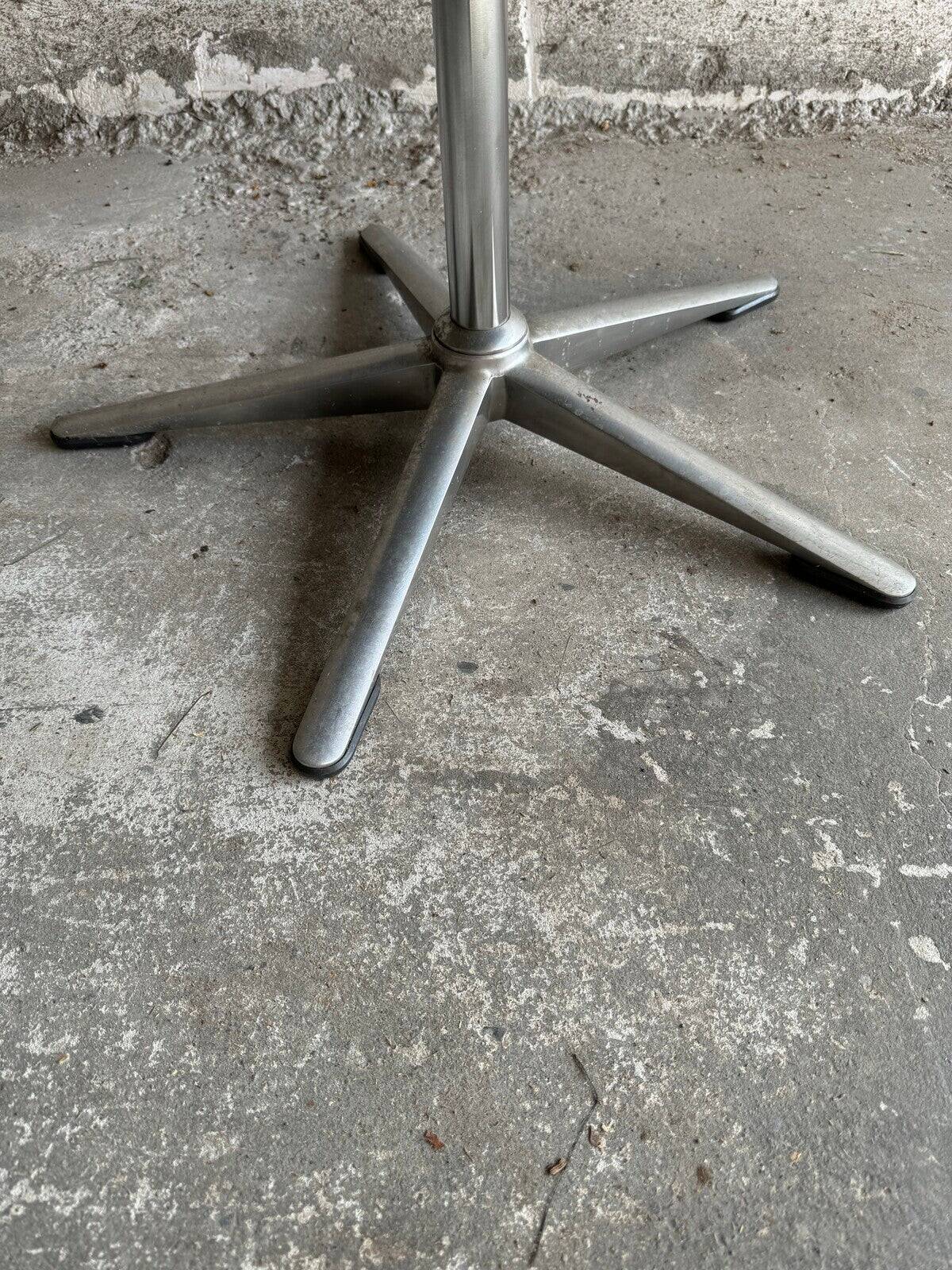 Wilkhahn Delta lounge chair in black leather with polished aluminum base and footrest (1970s)