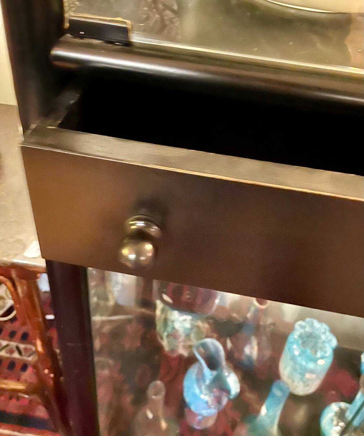 2 display cabinets signed by Baumann