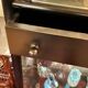 2 display cabinets signed by Baumann