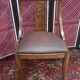 Gondola chair with art-deco motifs, spring leatherette seat