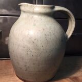 Pitcher in speckled gray enamelled sandstone signed