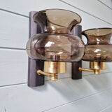 Pair of wall sconces in brass and smoked glass, 1960s.