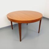 Large vintage Scandinavian round table from the 50s 60s in teak with extensions