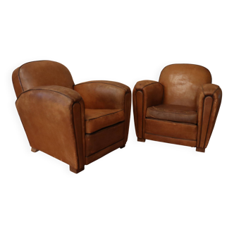 Pair of Art Deco leather club armchairs from the 1930s.
