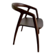 solid wood chair with dark wood armrests