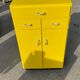 Yellow wooden chest of drawers