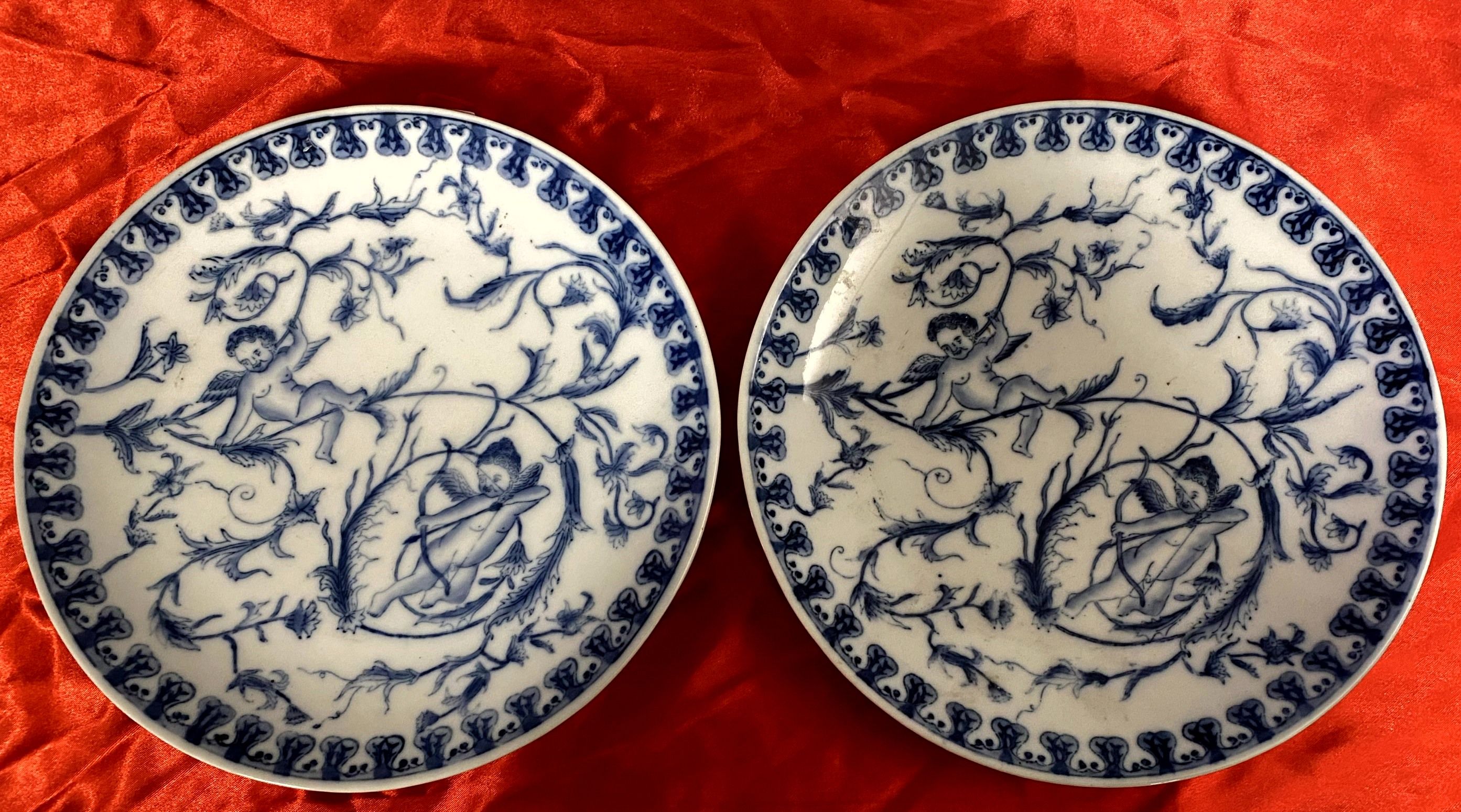 Pair of dishes with cherubs