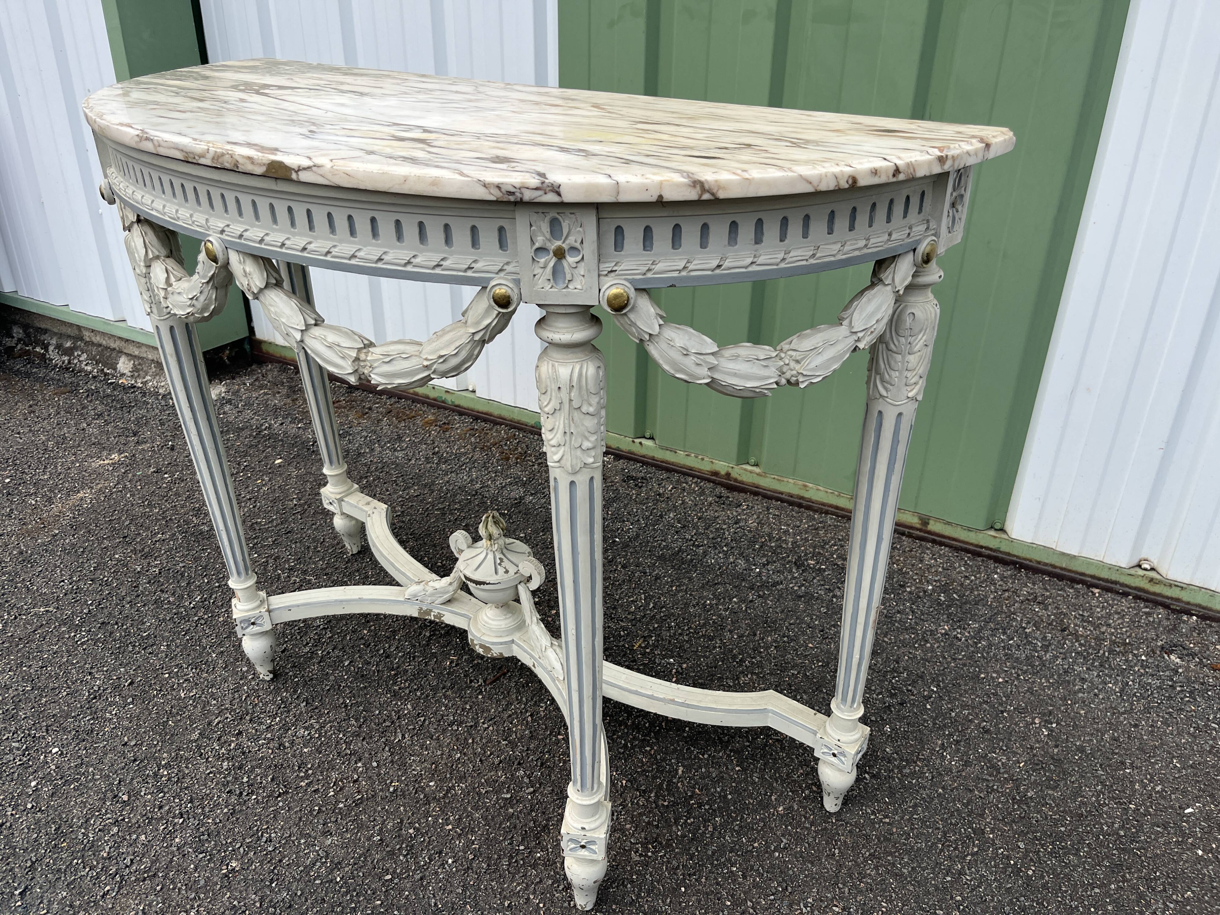 Louis XVI style half-moon console table with carved and painted wood and marble top