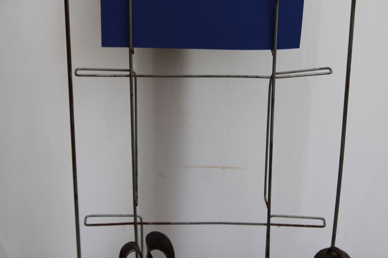 Former metal newspaper display