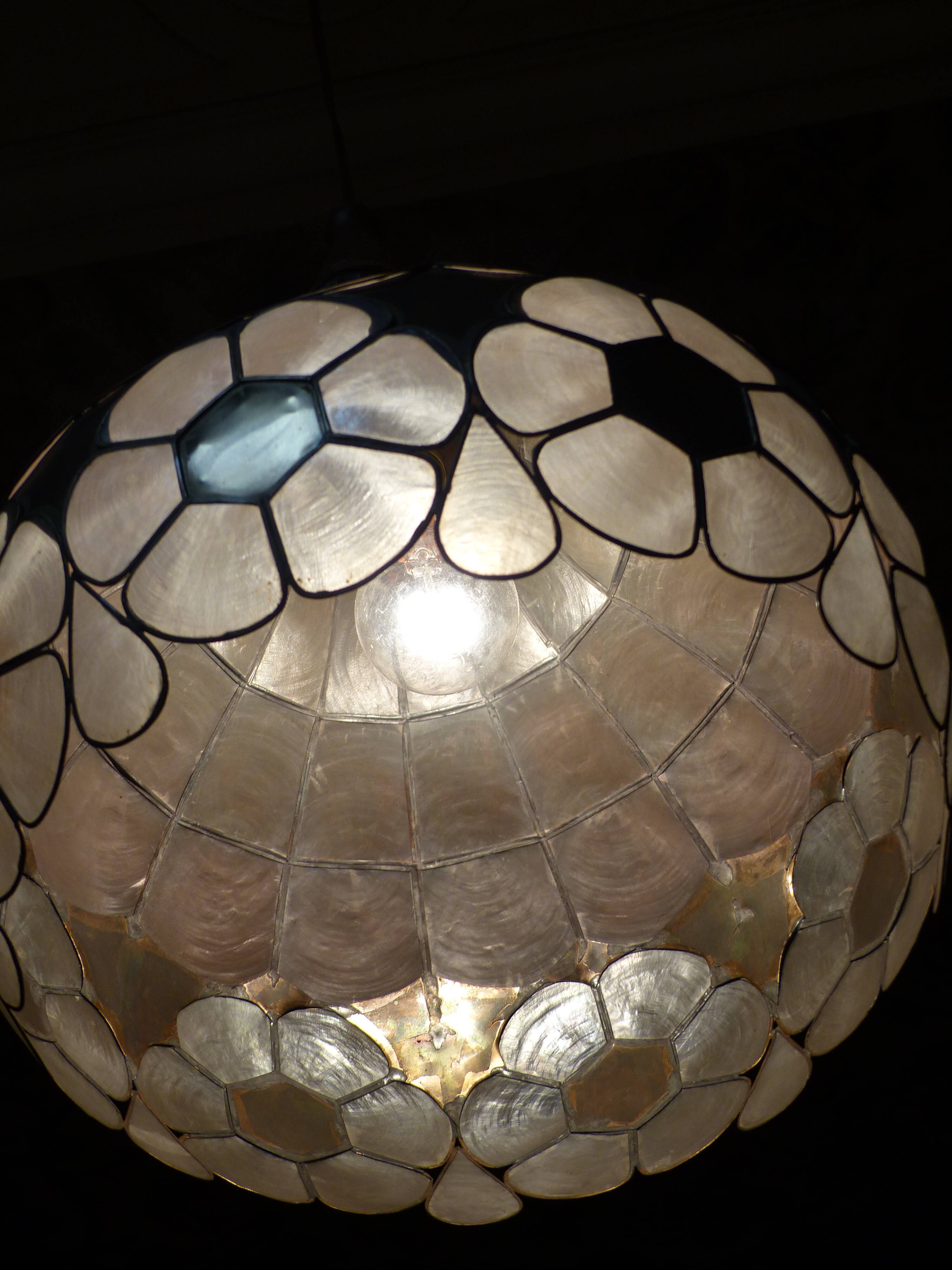 Colorful mother-of-pearl chandelier and brass