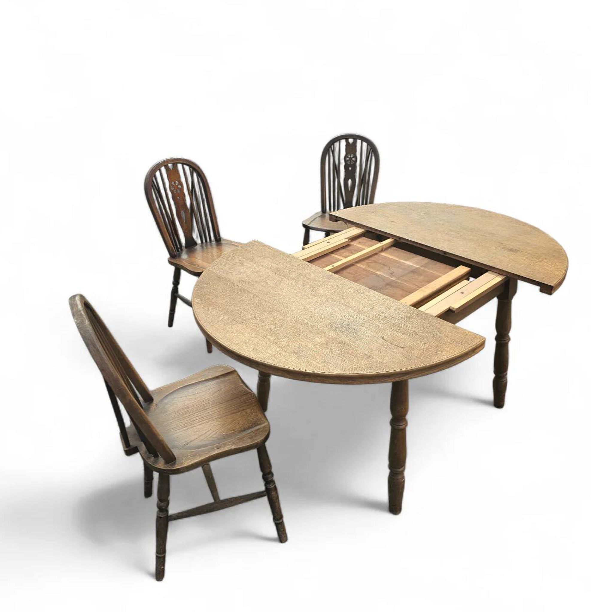 A slightly weathered Windsor wheelback dining set (7) by Oirschotse Meubelindustrie 1950s