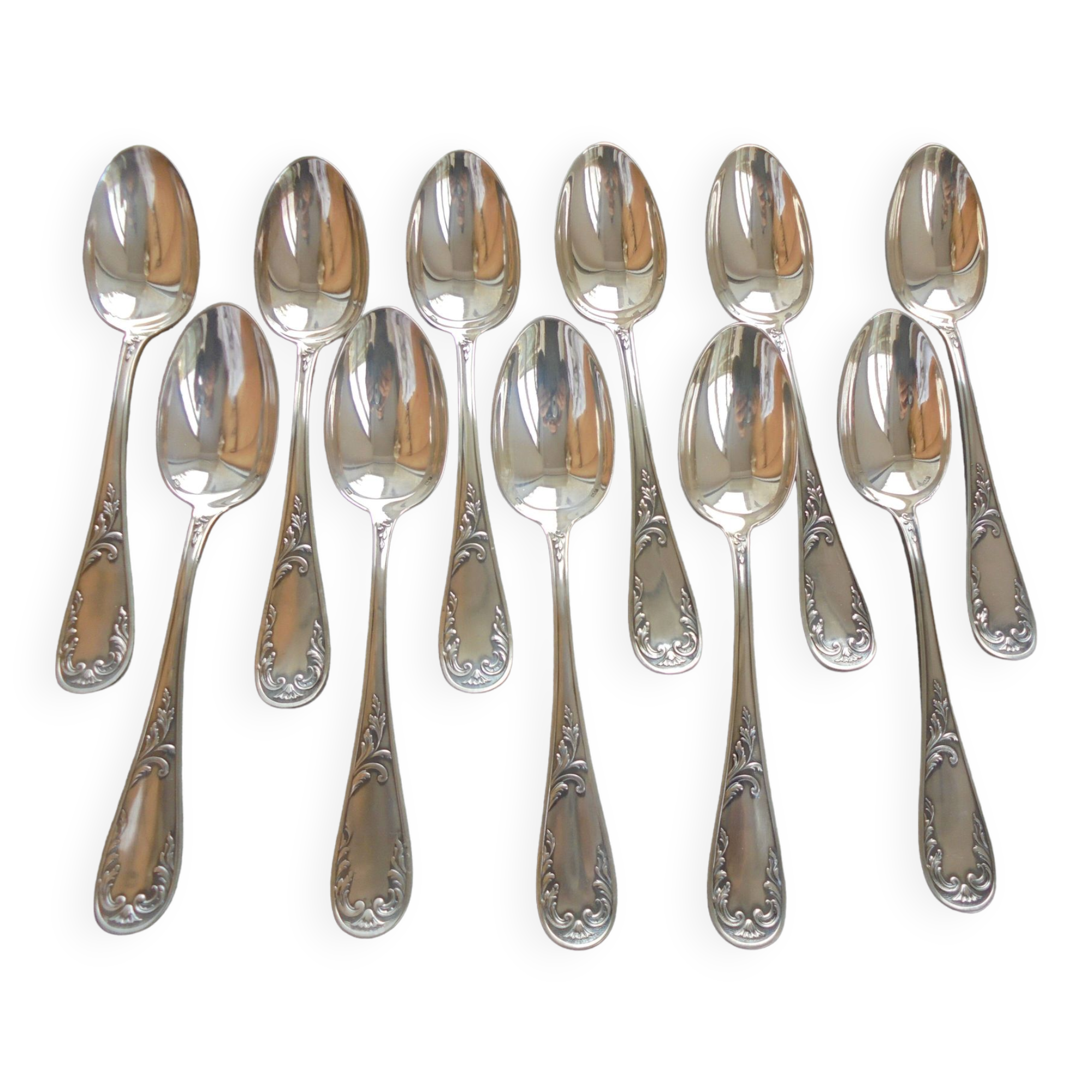 11 silver metal spoons
