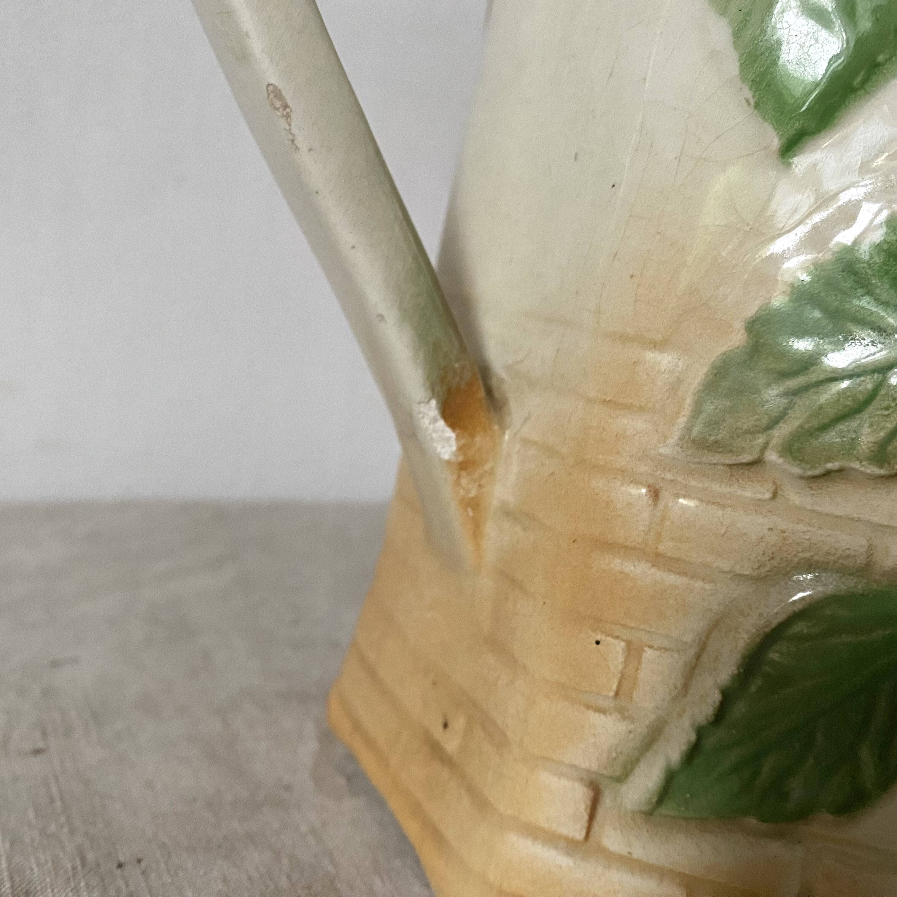 Antique pitcher in Apple slip