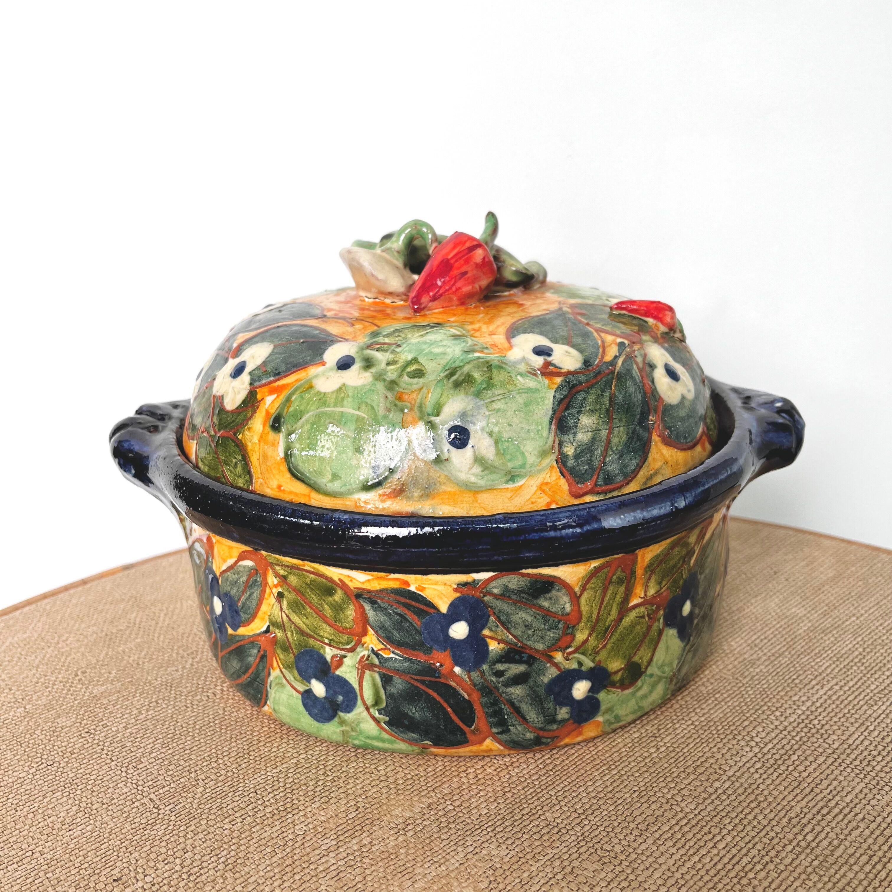 Old vegetable tureen in glazed terracotta