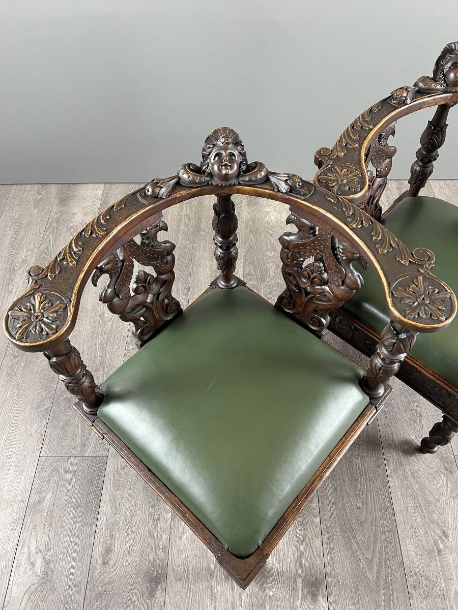 Pair of corner armchairs in carved wood, 19th century