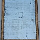 Antique mirror in a gilded wooden frame in the Louis XVI style, 19th century, 62x78 cm.