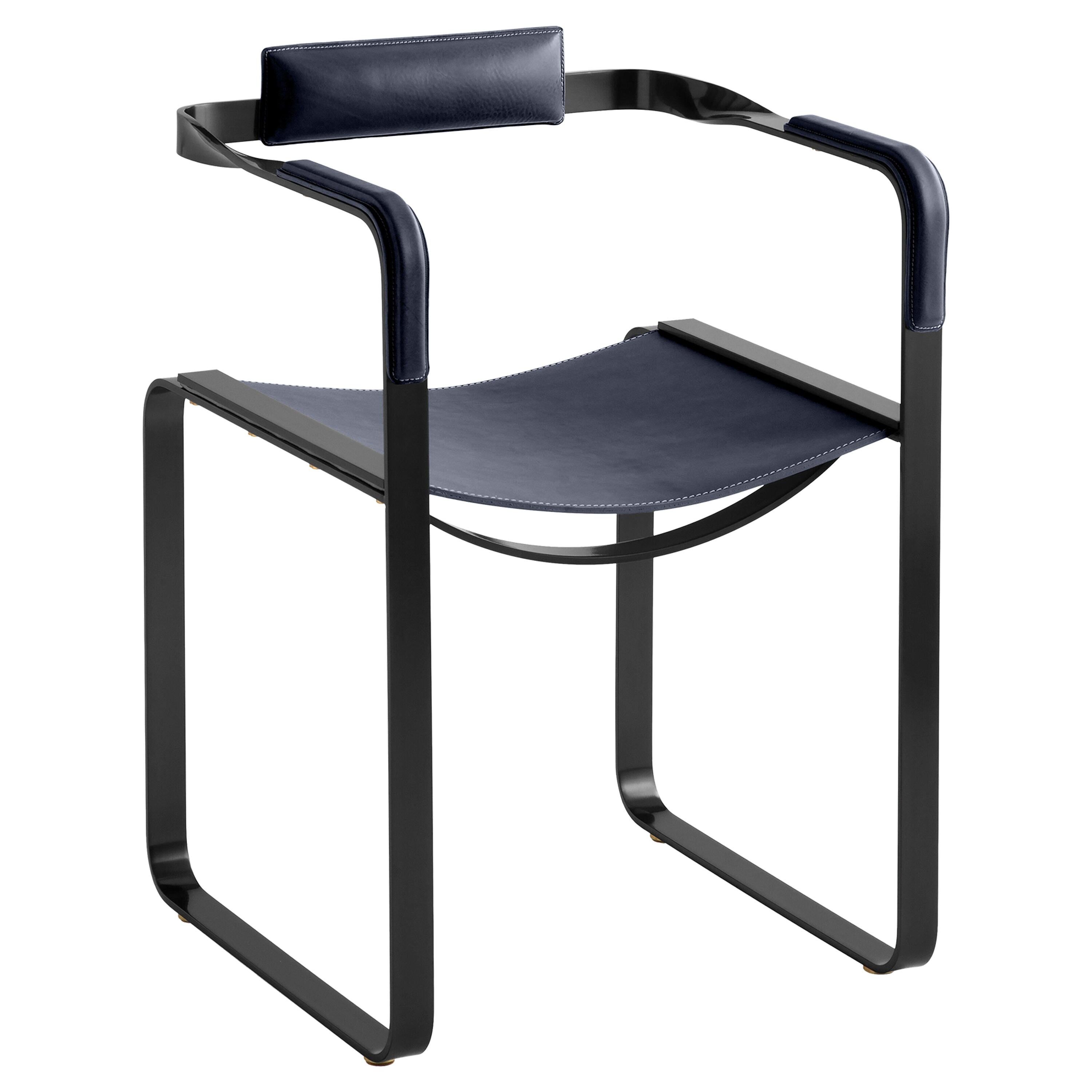 Armchair, smoked black steel and navy blue leather, contemporary style.