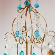 Italian chandelier in gold metal and blue crystal drops