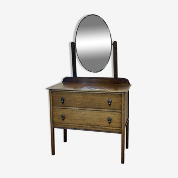1930s English oak dressing table with beveled oval mirror