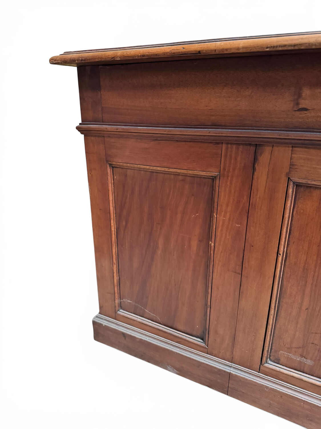 Oak desk with 9 drawers and leather writing pad.