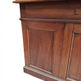 Oak desk with 9 drawers and leather writing pad.