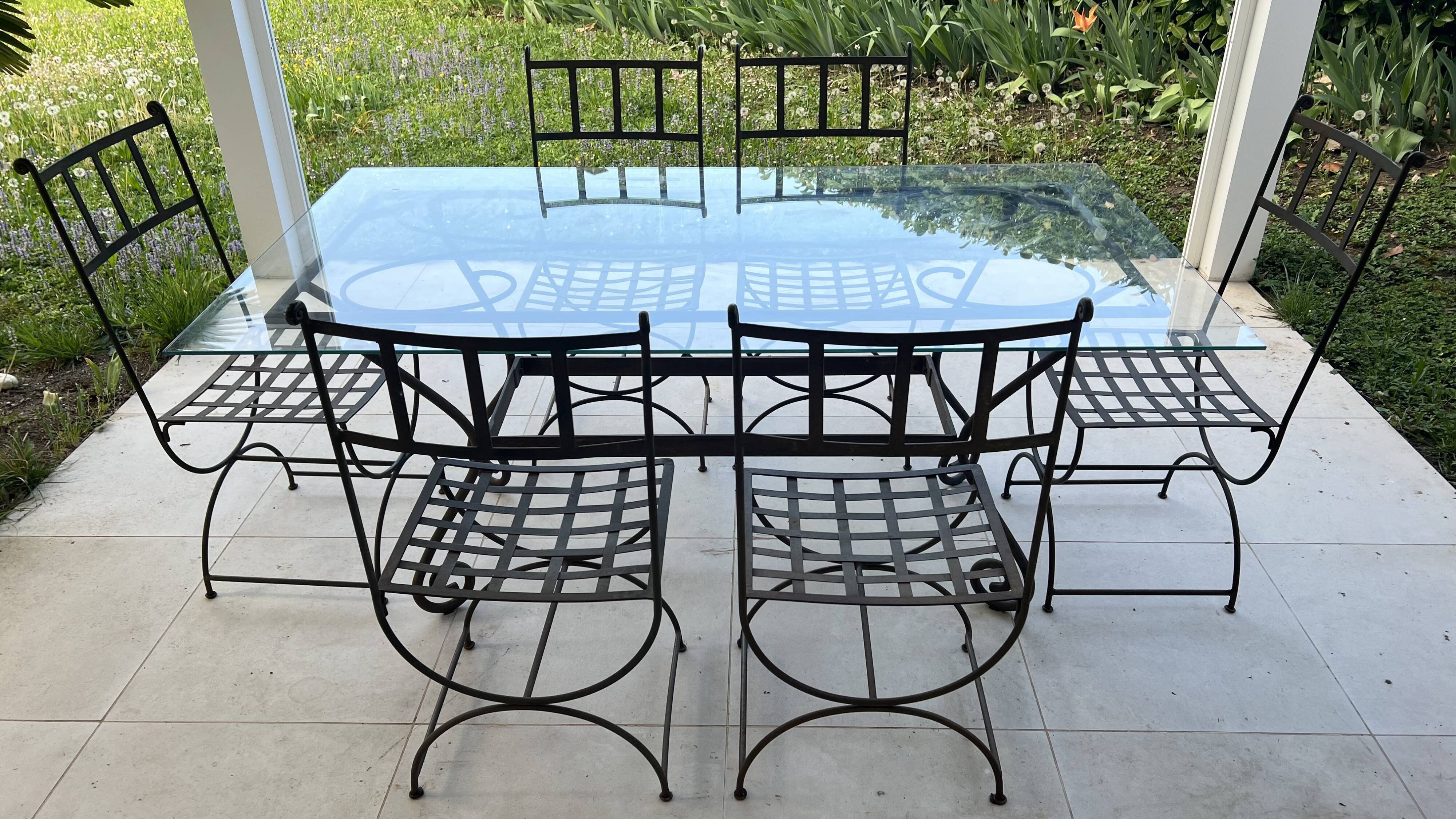 Table de terrasse plateau en verre + 6 chaises en fer forgé