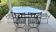 Terrace table with glass top + 6 wrought iron chairs
