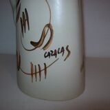 Ceramic pitcher with hand-painted decoration