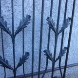 Pair of old wrought iron grid