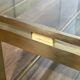 Modernist coffee table in brass and glass tops by Guy Lefèvre for Maison Jansen.