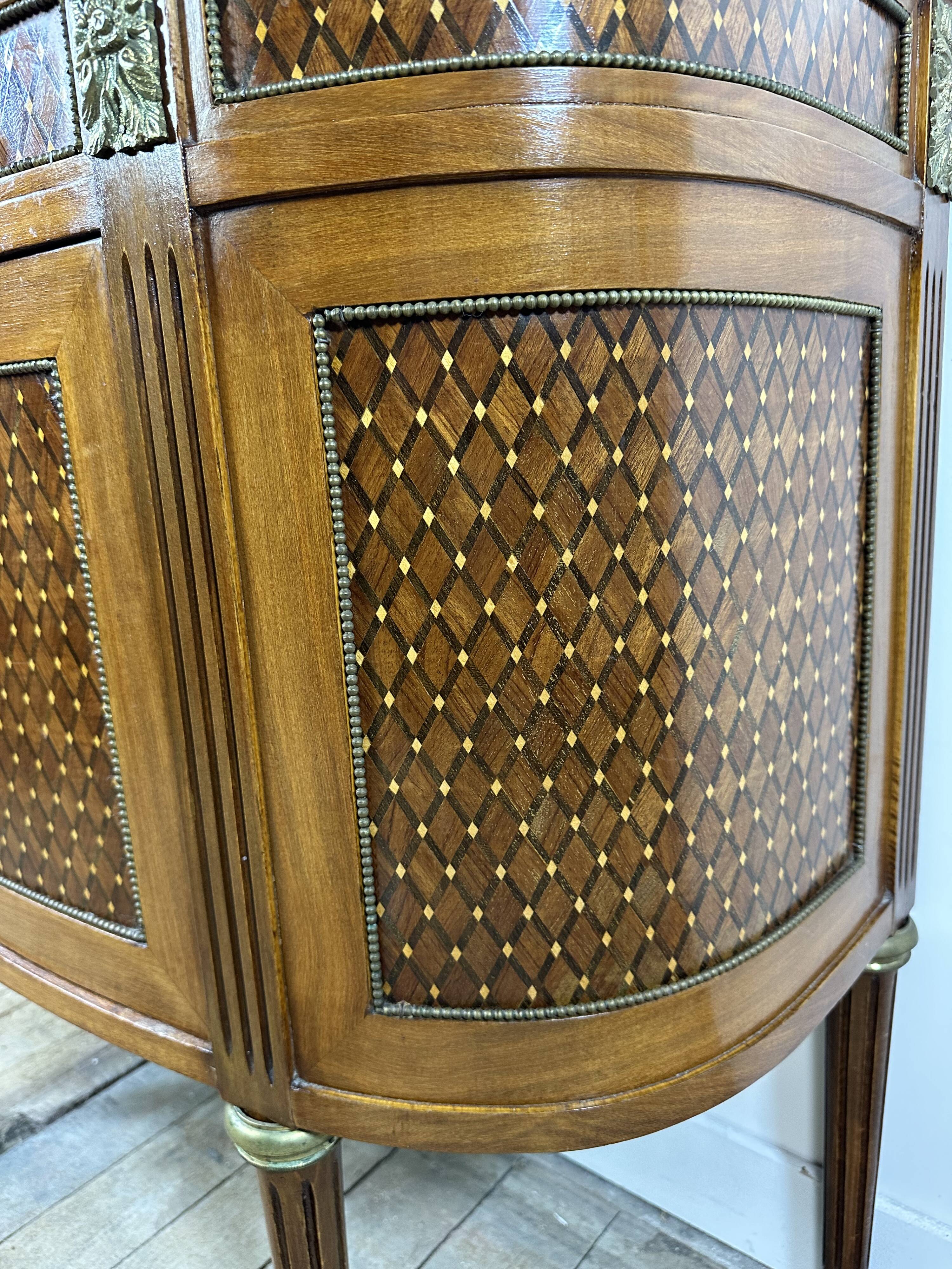 Half-moon commode in the Louis XVI style