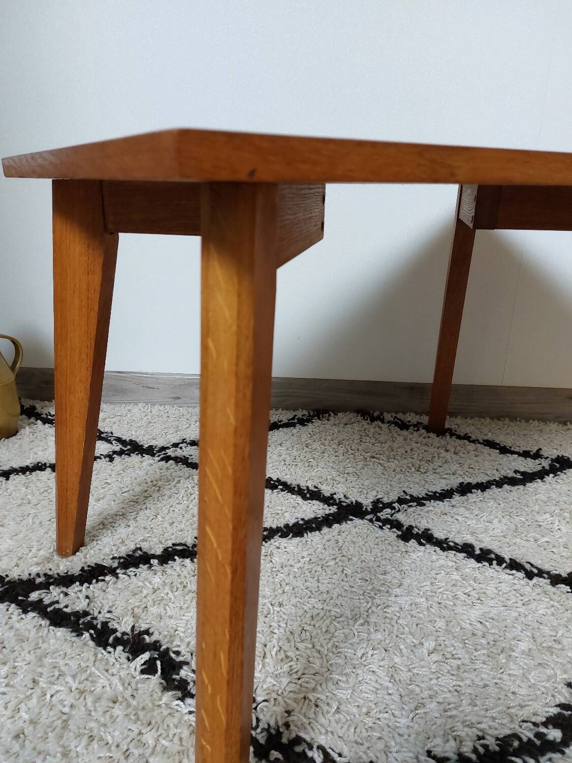 Coffee table with wooden compass legs
