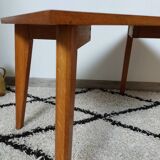 Coffee table with wooden compass legs