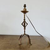 Large "Arts & Crafts" style lamp in beaten iron with a golden patina.
