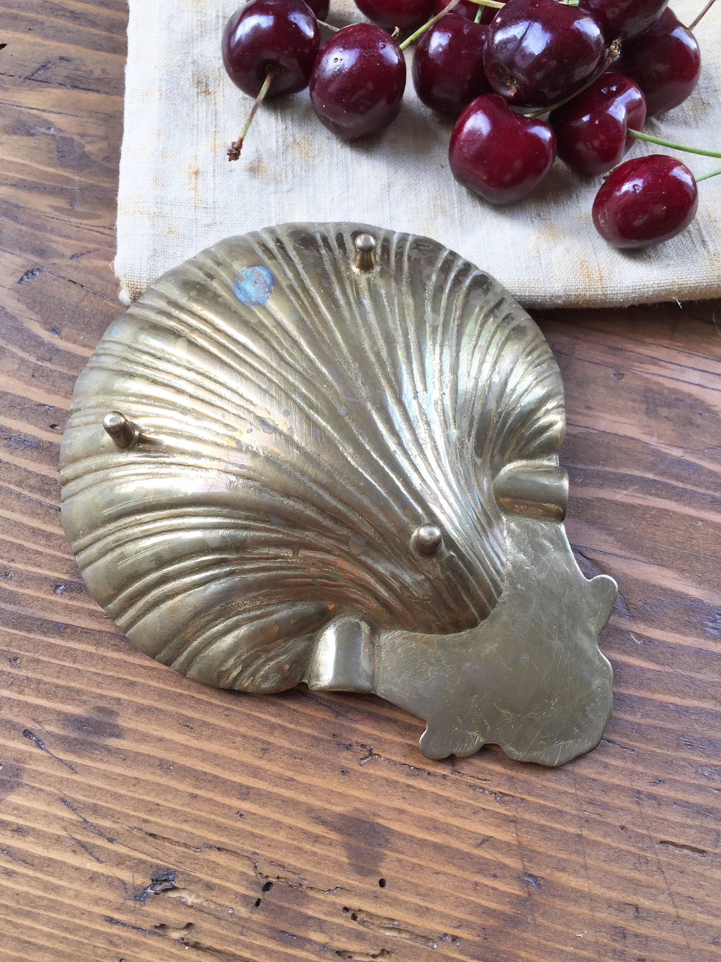Shell brass ashtray