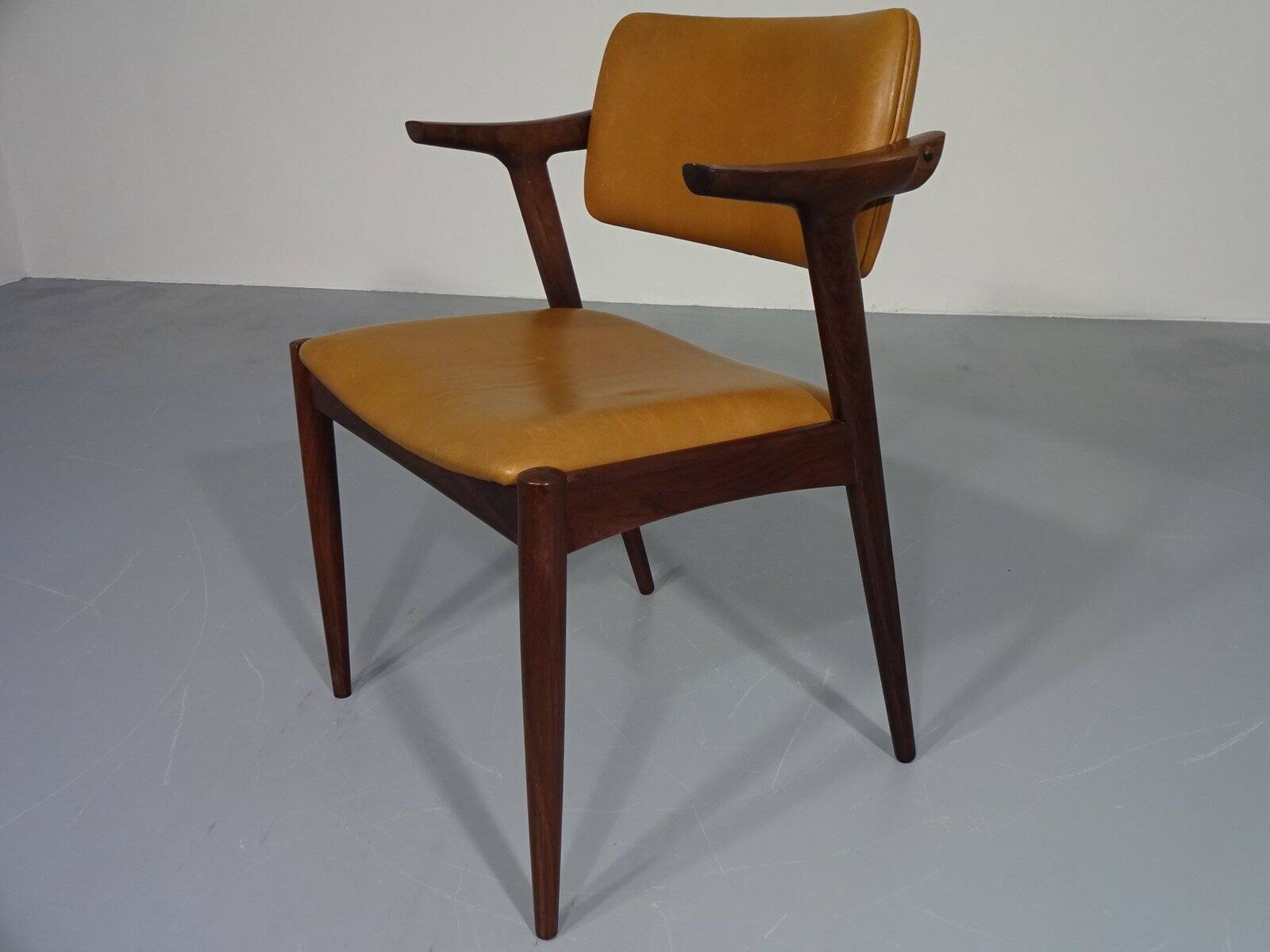 Rosewood and leather armchair from GM, 1960s