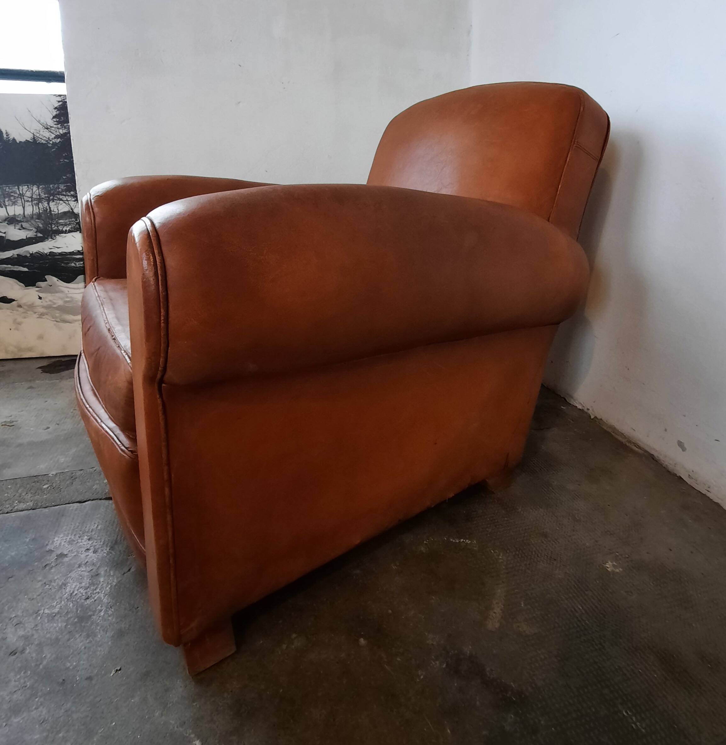 Old leather club chair 1940-1950
