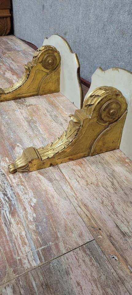 Pair of Louis XV style wall consoles in gilded wood